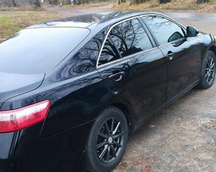 Черный Тойота Камри, объемом двигателя 2.36 л и пробегом 248 тыс. км за 10500 $, фото 6 на Automoto.ua