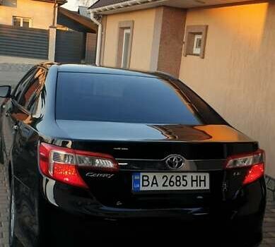 Черный Тойота Камри, объемом двигателя 2.5 л и пробегом 154 тыс. км за 9490 $, фото 28 на Automoto.ua