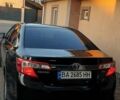 Черный Тойота Камри, объемом двигателя 2.5 л и пробегом 154 тыс. км за 9490 $, фото 28 на Automoto.ua