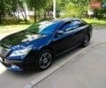 Черный Тойота Камри, объемом двигателя 2.5 л и пробегом 137 тыс. км за 14500 $, фото 1 на Automoto.ua