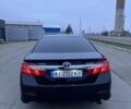Черный Тойота Камри, объемом двигателя 2.5 л и пробегом 203 тыс. км за 13500 $, фото 2 на Automoto.ua