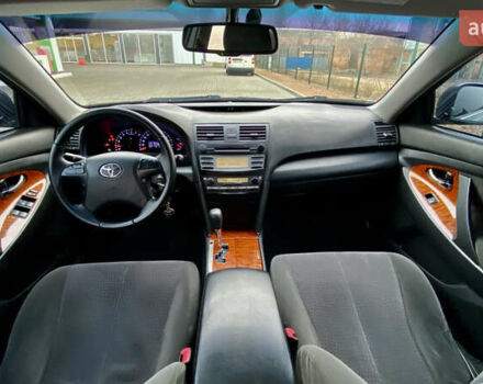 Черный Тойота Камри, объемом двигателя 2.4 л и пробегом 315 тыс. км за 9799 $, фото 1 на Automoto.ua