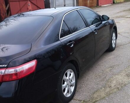Чорний Тойота Камрі, об'ємом двигуна 2.4 л та пробігом 248 тис. км за 10100 $, фото 2 на Automoto.ua