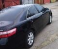 Чорний Тойота Камрі, об'ємом двигуна 2.4 л та пробігом 248 тис. км за 10100 $, фото 2 на Automoto.ua