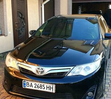 Черный Тойота Камри, объемом двигателя 2.5 л и пробегом 154 тыс. км за 9490 $, фото 41 на Automoto.ua