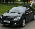 Черный Тойота Камри, объемом двигателя 2.49 л и пробегом 280 тыс. км за 12000 $, фото 1 на Automoto.ua
