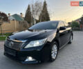 Черный Тойота Камри, объемом двигателя 2.5 л и пробегом 220 тыс. км за 13750 $, фото 19 на Automoto.ua