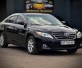 Чорний Тойота Камрі, об'ємом двигуна 2.4 л та пробігом 220 тис. км за 10500 $, фото 1 на Automoto.ua