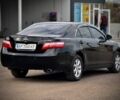 Чорний Тойота Камрі, об'ємом двигуна 2.4 л та пробігом 220 тис. км за 10500 $, фото 4 на Automoto.ua
