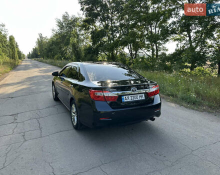 Черный Тойота Камри, объемом двигателя 2.49 л и пробегом 188 тыс. км за 13500 $, фото 3 на Automoto.ua