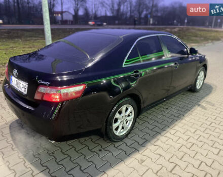 Черный Тойота Камри, объемом двигателя 2.4 л и пробегом 315 тыс. км за 9799 $, фото 14 на Automoto.ua