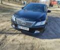 Черный Тойота Камри, объемом двигателя 2.5 л и пробегом 294 тыс. км за 13000 $, фото 1 на Automoto.ua