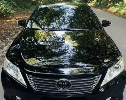Черный Тойота Камри, объемом двигателя 2.5 л и пробегом 250 тыс. км за 13000 $, фото 33 на Automoto.ua