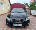 Черный Тойота Камри, объемом двигателя 2.4 л и пробегом 199 тыс. км за 12500 $, фото 1 на Automoto.ua
