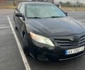Черный Тойота Камри, объемом двигателя 2.5 л и пробегом 322 тыс. км за 10000 $, фото 1 на Automoto.ua