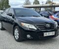 Черный Тойота Камри, объемом двигателя 2.4 л и пробегом 196 тыс. км за 9800 $, фото 1 на Automoto.ua