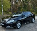 Чорний Тойота Камрі, об'ємом двигуна 2.49 л та пробігом 265 тис. км за 12200 $, фото 1 на Automoto.ua