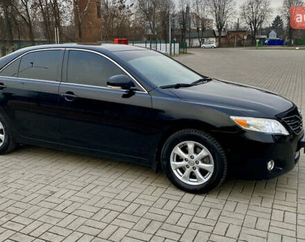Черный Тойота Камри, объемом двигателя 2.4 л и пробегом 315 тыс. км за 9799 $, фото 11 на Automoto.ua