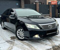 Черный Тойота Камри, объемом двигателя 2.5 л и пробегом 195 тыс. км за 13850 $, фото 17 на Automoto.ua