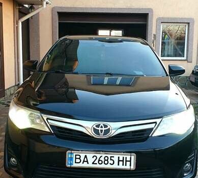 Черный Тойота Камри, объемом двигателя 2.5 л и пробегом 154 тыс. км за 9490 $, фото 24 на Automoto.ua