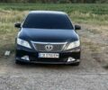 Черный Тойота Камри, объемом двигателя 2.49 л и пробегом 211 тыс. км за 14300 $, фото 1 на Automoto.ua
