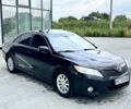 Черный Тойота Камри, объемом двигателя 2.5 л и пробегом 290 тыс. км за 9550 $, фото 1 на Automoto.ua