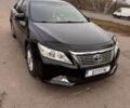 Черный Тойота Камри, объемом двигателя 2.5 л и пробегом 233 тыс. км за 11000 $, фото 1 на Automoto.ua