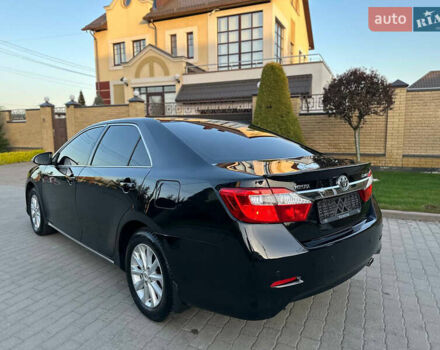 Черный Тойота Камри, объемом двигателя 2.5 л и пробегом 220 тыс. км за 13750 $, фото 16 на Automoto.ua