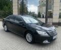 Черный Тойота Камри, объемом двигателя 2.5 л и пробегом 220 тыс. км за 12500 $, фото 1 на Automoto.ua