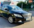 Черный Тойота Камри, объемом двигателя 2.5 л и пробегом 212 тыс. км за 13300 $, фото 1 на Automoto.ua