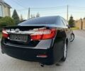 Черный Тойота Камри, объемом двигателя 2.5 л и пробегом 220 тыс. км за 13750 $, фото 5 на Automoto.ua