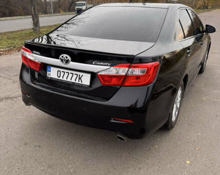 Чорний Тойота Камрі, об'ємом двигуна 2.49 л та пробігом 236 тис. км за 11000 $, фото 3 на Automoto.ua