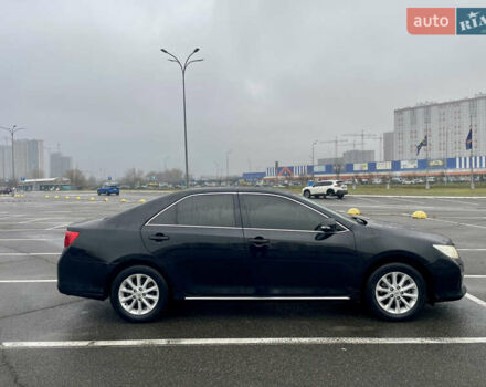 Черный Тойота Камри, объемом двигателя 2.49 л и пробегом 202 тыс. км за 12400 $, фото 3 на Automoto.ua