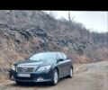 Черный Тойота Камри, объемом двигателя 2.5 л и пробегом 190 тыс. км за 10500 $, фото 1 на Automoto.ua