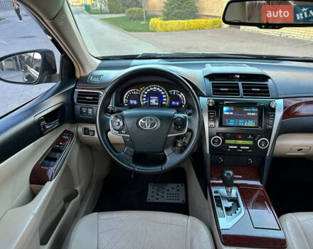 Черный Тойота Камри, объемом двигателя 2.5 л и пробегом 220 тыс. км за 13750 $, фото 42 на Automoto.ua