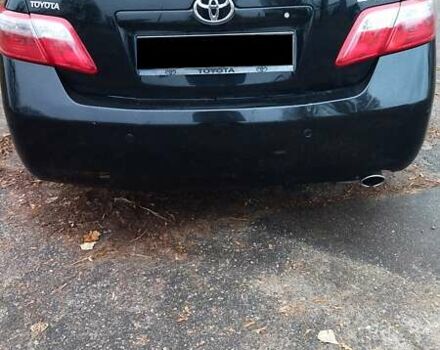 Черный Тойота Камри, объемом двигателя 2.36 л и пробегом 248 тыс. км за 10500 $, фото 1 на Automoto.ua