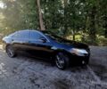 Черный Тойота Камри, объемом двигателя 2.4 л и пробегом 268 тыс. км за 9200 $, фото 1 на Automoto.ua