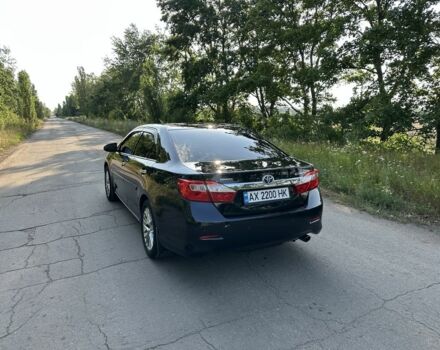 Черный Тойота Камри, объемом двигателя 2.5 л и пробегом 188 тыс. км за 14000 $, фото 3 на Automoto.ua