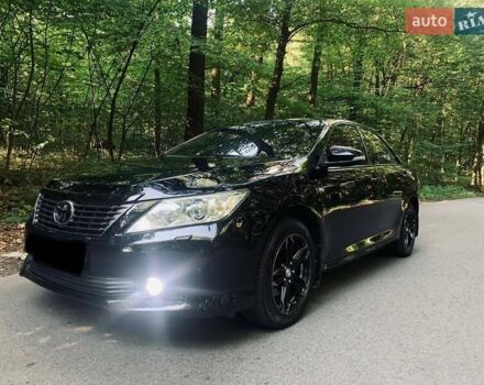 Черный Тойота Камри, объемом двигателя 2.5 л и пробегом 250 тыс. км за 13000 $, фото 5 на Automoto.ua