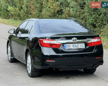Черный Тойота Камри, объемом двигателя 2.5 л и пробегом 198 тыс. км за 12950 $, фото 7 на Automoto.ua