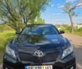 Черный Тойота Камри, объемом двигателя 2.49 л и пробегом 230 тыс. км за 14500 $, фото 1 на Automoto.ua