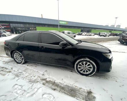 Черный Тойота Камри, объемом двигателя 2.5 л и пробегом 290 тыс. км за 13500 $, фото 1 на Automoto.ua
