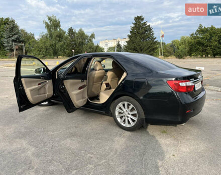 Черный Тойота Камри, объемом двигателя 3.5 л и пробегом 295 тыс. км за 15000 $, фото 20 на Automoto.ua