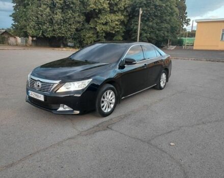Черный Тойота Камри, объемом двигателя 2.5 л и пробегом 263 тыс. км за 13200 $, фото 4 на Automoto.ua