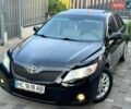 Черный Тойота Камри, объемом двигателя 2.5 л и пробегом 290 тыс. км за 9550 $, фото 1 на Automoto.ua