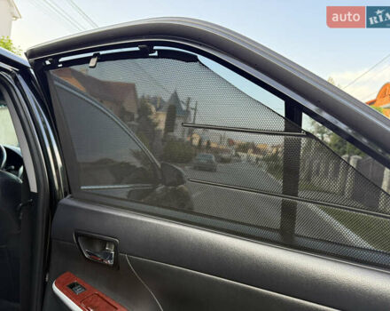 Чорний Тойота Камрі, об'ємом двигуна 3.46 л та пробігом 210 тис. км за 13500 $, фото 13 на Automoto.ua