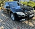 Черный Тойота Камри, объемом двигателя 2.49 л и пробегом 210 тыс. км за 13200 $, фото 1 на Automoto.ua