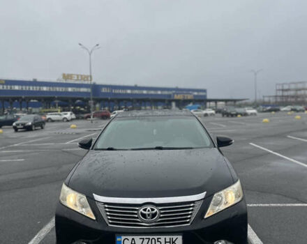Черный Тойота Камри, объемом двигателя 2.49 л и пробегом 202 тыс. км за 12400 $, фото 1 на Automoto.ua