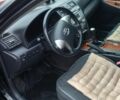 Чорний Тойота Камрі, об'ємом двигуна 2.4 л та пробігом 248 тис. км за 10100 $, фото 3 на Automoto.ua