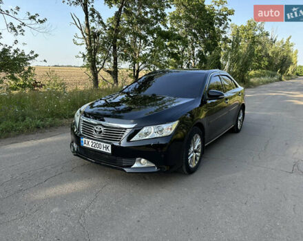 Черный Тойота Камри, объемом двигателя 2.49 л и пробегом 188 тыс. км за 13500 $, фото 1 на Automoto.ua